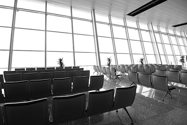 istock empty chairs in the airport terminal 489729906