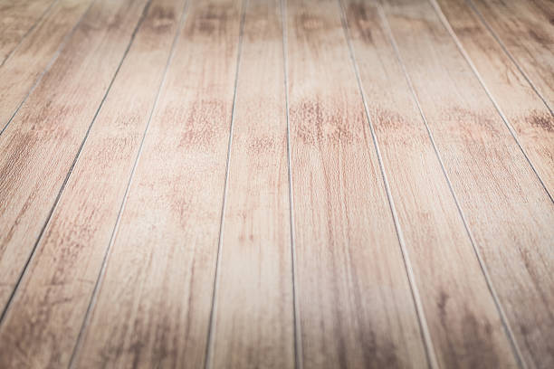 Background of  bleached wooden floor Background of  bleached wooden floor with selective focus and vintage tone. parquet floor perspective stock pictures, royalty-free photos & images