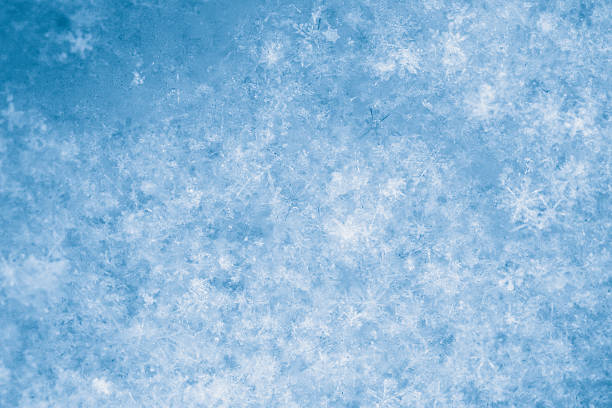 istock Winter background snowflakes blue & white 489733526