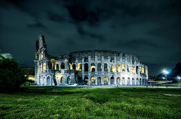 istock Coliseum (Colosseum) at night in Rome 489733760