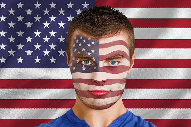 istock Serious young usa fan with facepaint 489748863