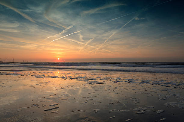 istock moody sky and its reflection in the water 489749207