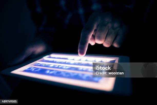 Tablet Use In The Dark Stock Photo - Download Image Now - Internet, Sports Betting, Gambling