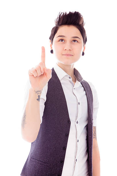 istock Young woman pointing upward 489750027