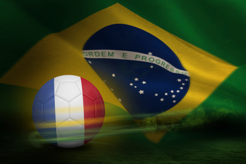 Football in france colours against brazilian flag waving