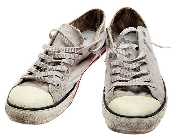 istock dirty sneakers isolated on a white background 489751781