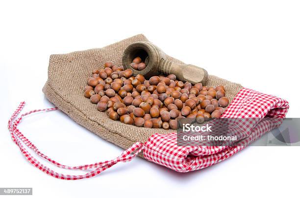 Hazelnuts And A Nutcracker On A Burlap Bag Stock Photo - Download Image Now - Bag, Brown, Burlap