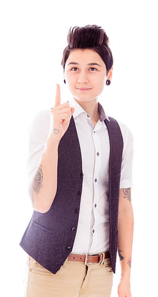 istock Young woman pointing upward 489752221