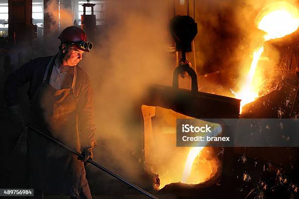 Hard Work In The Foundry Stock Photo - Download Image Now - Steel Worker, Steel Mill, Foundry