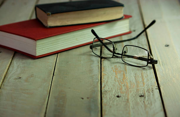 istock Books on an old wooden surface 489758474