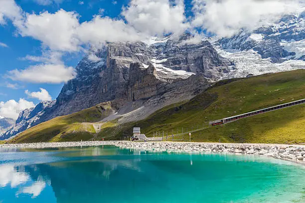 Stunning view of Eiger Northface and the glacier at the lake side of Fallbodensee on Bernese Oberland, Switzerland.