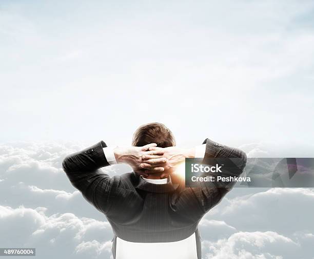 Man Looking At Cloud Stock Photo - Download Image Now - 2015, Adult, Beautiful People