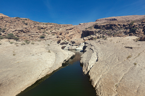 riverbed at wadi bani khalid, oman.