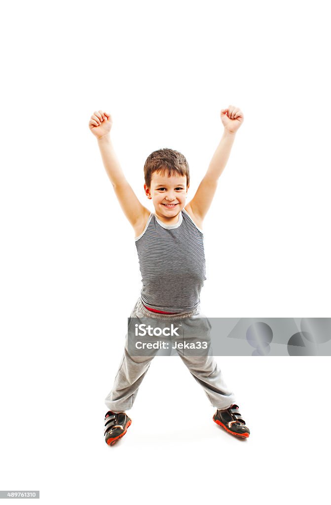 Happy boy standing with arms open Happy boy standing with arms open. Isolated on white background 2015 Stock Photo