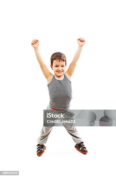 Happy Boy Standing With Arms Open Stock Photo - Download Image Now - 2015, 6-7 Years, Accessibility