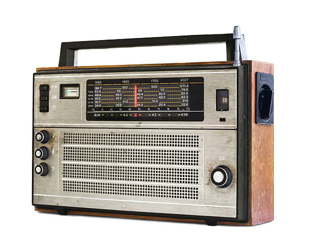 Old radio Old transistor radio isolated on white vintage portable silver radio stock pictures, royalty-free photos & images