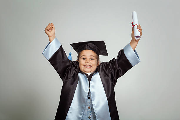 istock Little Girl Graduate 489763846