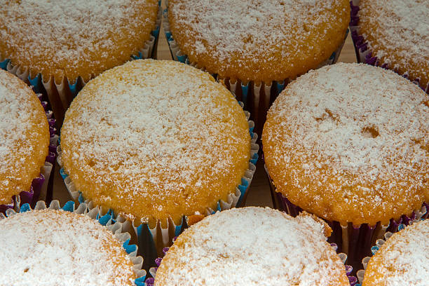 istock Homemade cupcakes with powdered sugar, close-up 489764848