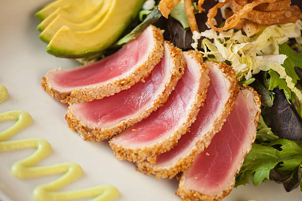 istock Sesame Crusted Seared Ahi with Baby Greens 489765438