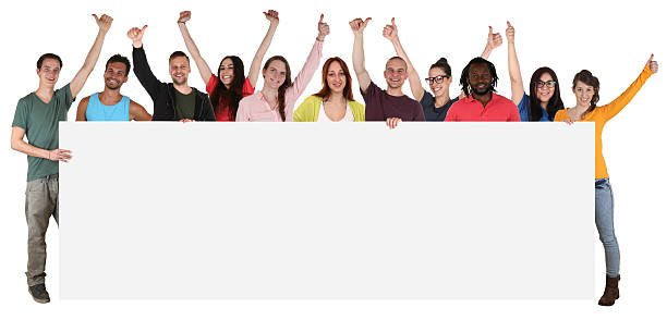 istock Group of young smiling multi ethnic people holding empty banner 489768234
