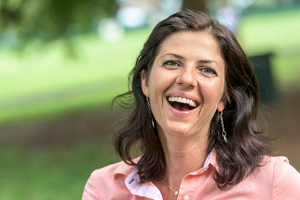 istock Laughing mature woman 489768318