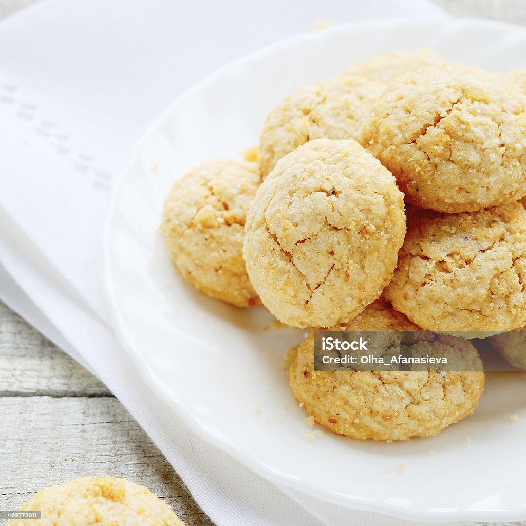 mini almond cookies on white plate mini almond cookies on white plate, food Almond Stock Photo