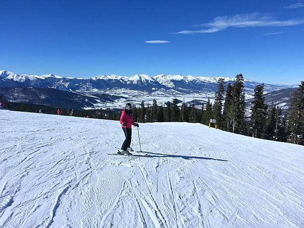 istock Young Woman Skiing 489774651