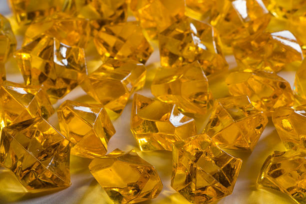istock Granules of the transparent yellow plastic 489775025