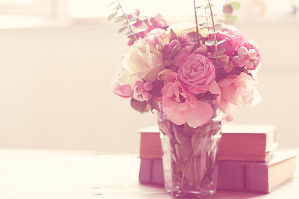 istock flowers and ancient books 489775782