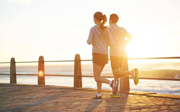 istock Seaside jog at sunrise 489775955