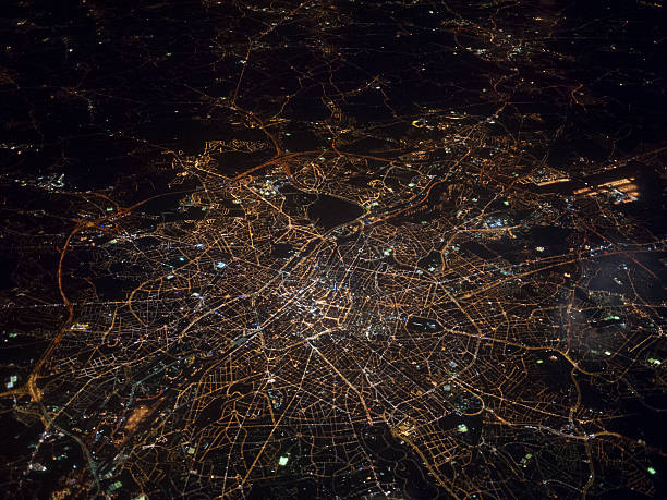 Aerial view of Brussels at night An aerial view of Brussels at night, taken from within an aeroplane city of brussels stock pictures, royalty-free photos & images