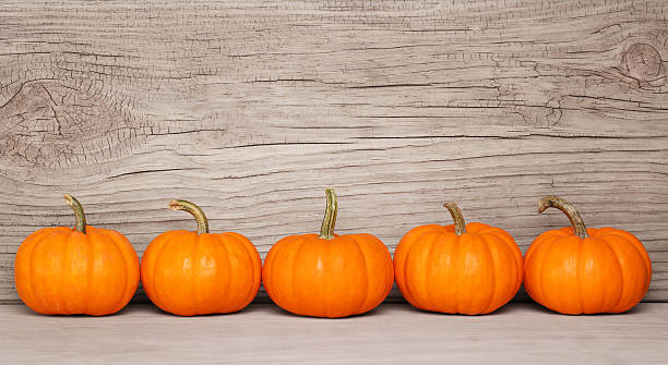 istock Pumpkins over Wooden Background. Harvest 489785228