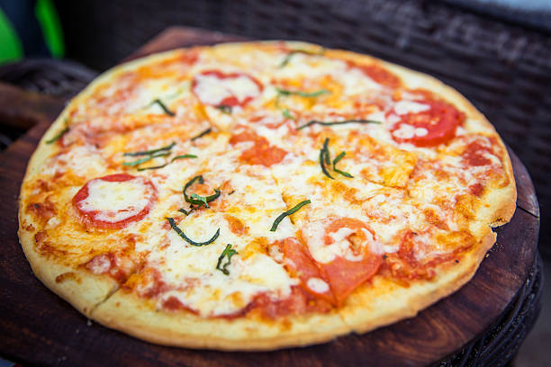 Close up salami pizza and mozarella cheese slices