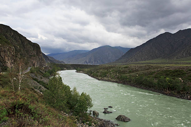 istock Storm clouds over Chuysky Trakt and river Katun 489788556