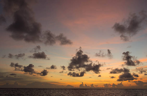 istock Evening cloudy sky over the ocean at sunset 489789682