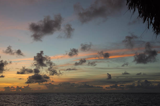 istock Evening cloudy sky over the ocean at sunset 489789716