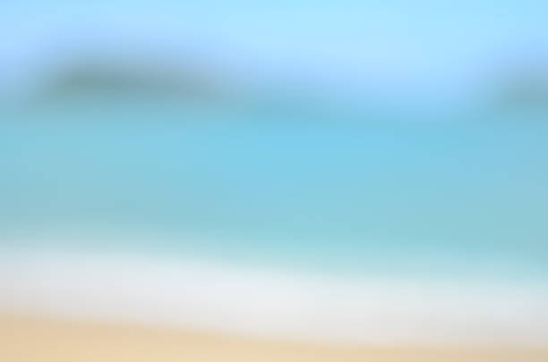 istock Blur tropical beach with sun light abstract background.Travel concept. 489803538