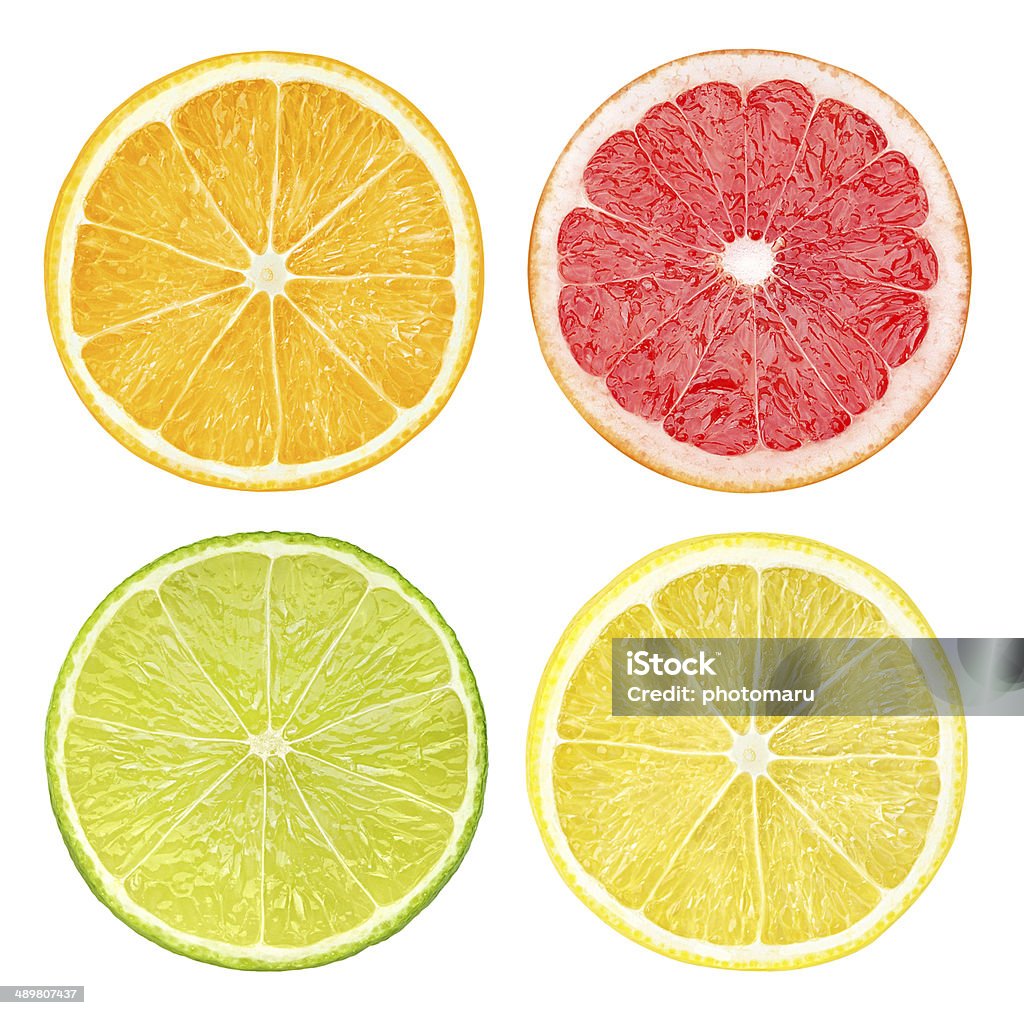 Slices of citrus fruits isolated on white Slices of citrus fruits isolated on white. Citrus Fruit Stock Photo