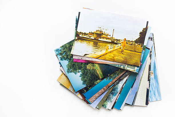 Pictures of holiday. A pile of photographs with your empty space. printout photos stock pictures, royalty-free photos & images