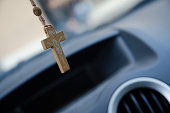 Rosary Beads with Crucifix in a Car