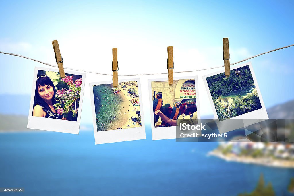 photos of holiday hanging on clothesline with sea photos of holiday people hanging on clothesline with sea background Vacations Stock Photo
