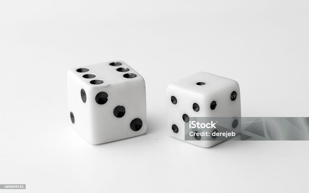 Says Two white dice thrown to reveal the values six and one Chance Stock Photo