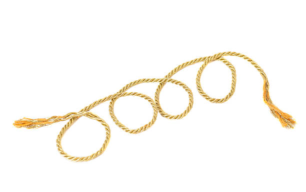 istock golden rope isolated on white background 489809992