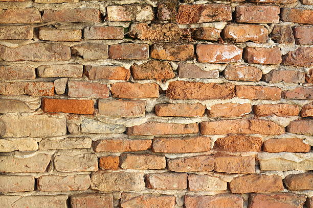 antigua pared de ladrillo viejo - retro revival pattern masonry old fotografías e imágenes de stock