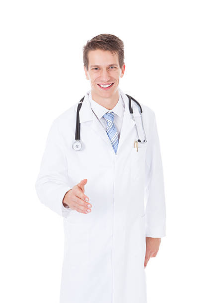 istock Young Male Doctor Offering Handshake 489813120