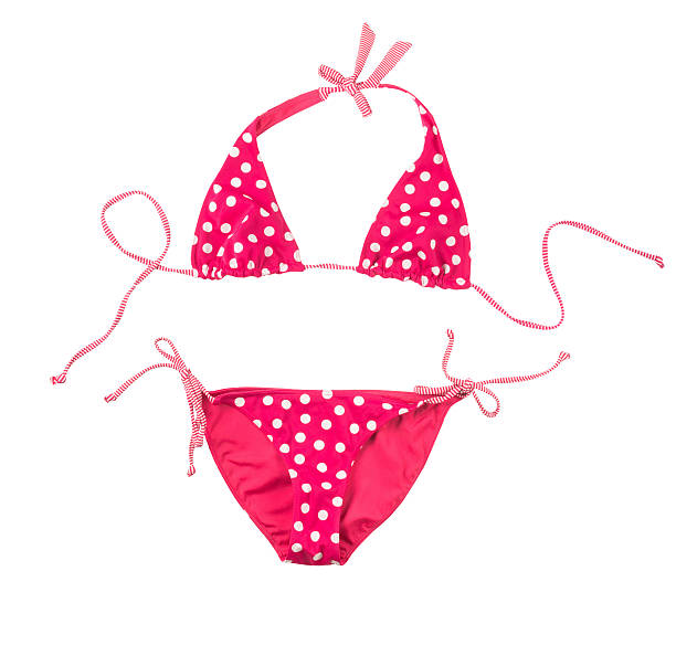 istock pink swimsuit with white polka dots 489813572