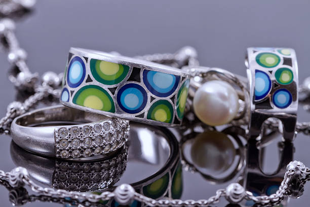 istock Silver jewelry with colored enamel and silver chain 489814042