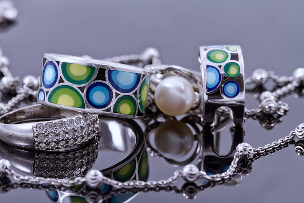 istock Silver jewelry with colored enamel and silver chain 489814070