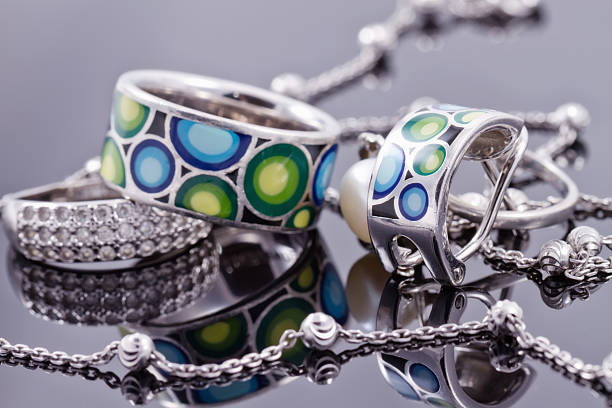 istock Unusual beautiful silver chain and a silver ring with gems 489814142