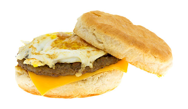 istock Breakfast sausage egg and cheese biscuit on a white background 489830784